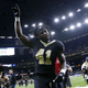 Illustration for article titled New Orleans Saints Running Back Alvin Kamara Wears Kaepernick Jersey and Make Africa Home Again Hatem/em
